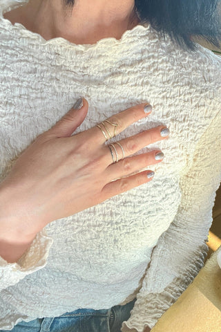 The Six Elements Goddess - Earth Silver Stacking Ring set worn on a hand