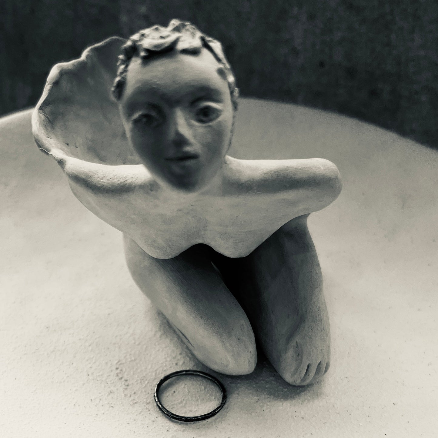 The Six Elements Goddess - Earth Silver Stacking Ring a hand sculpted ceramic angel  black and white photo