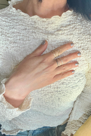 Golden Trinity – Elemental Ring Set Fire, Light and Spirit on a model - 6 elements Studio