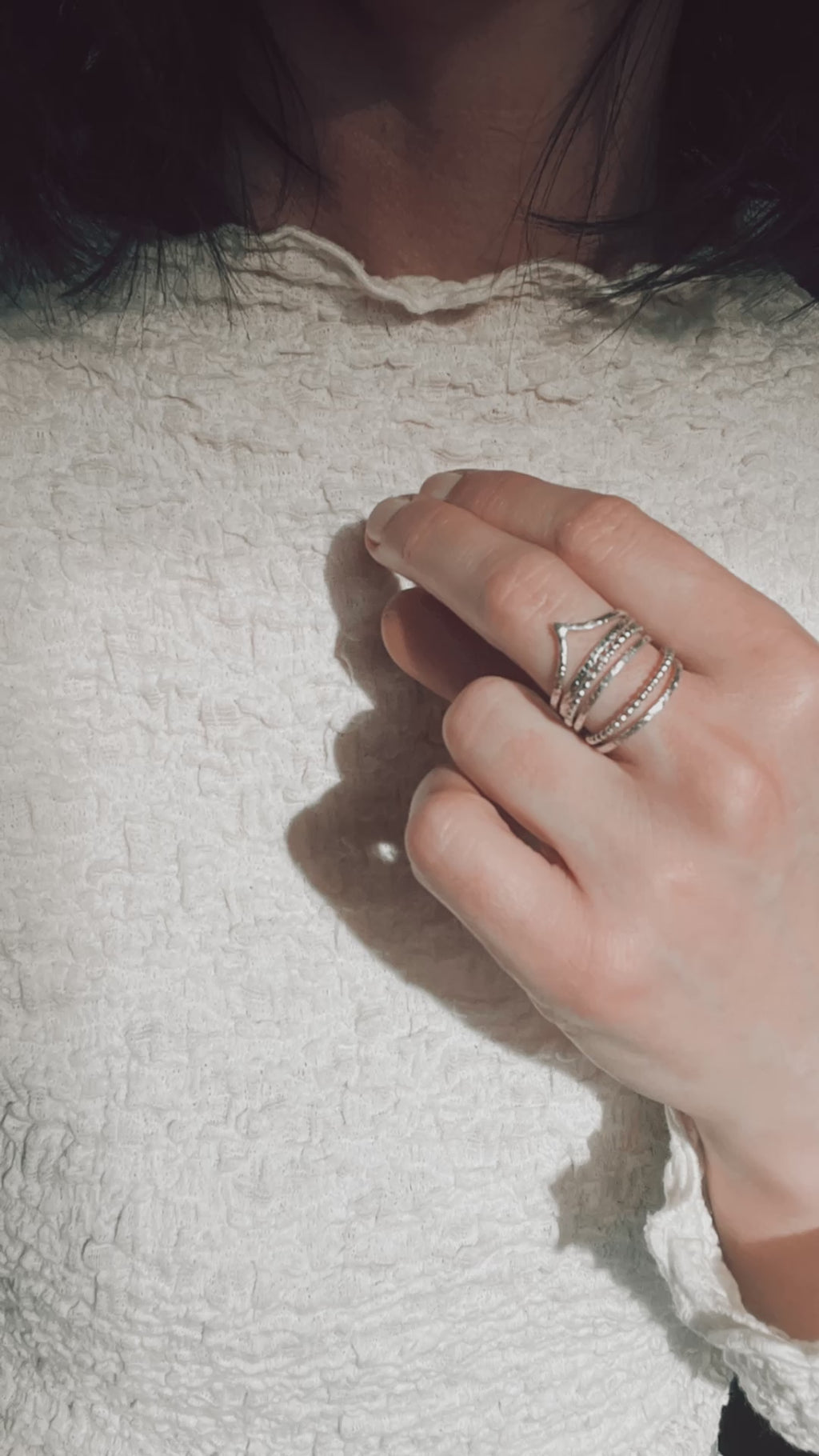 sterling silver set on a models hand