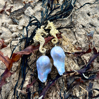Eternal Pair – Seahorse Pearl Earrings balance and beauty with sculpted silver seahorses, 24ct gold accents, baroque pearls.