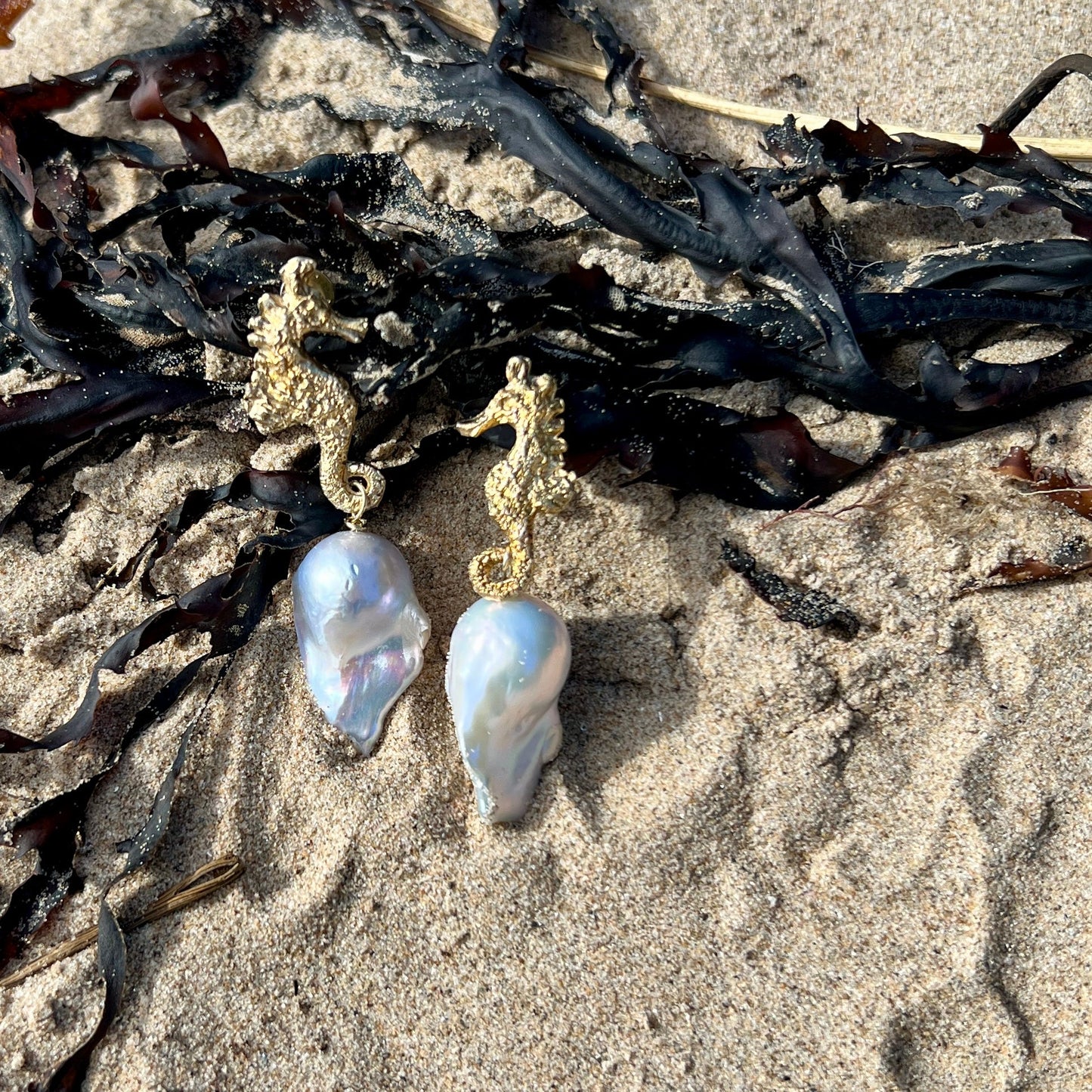 Eternal Pair – Seahorse Pearl Earrings balance and beauty with sculpted silver seahorses, 24ct gold accents, baroque pearls.