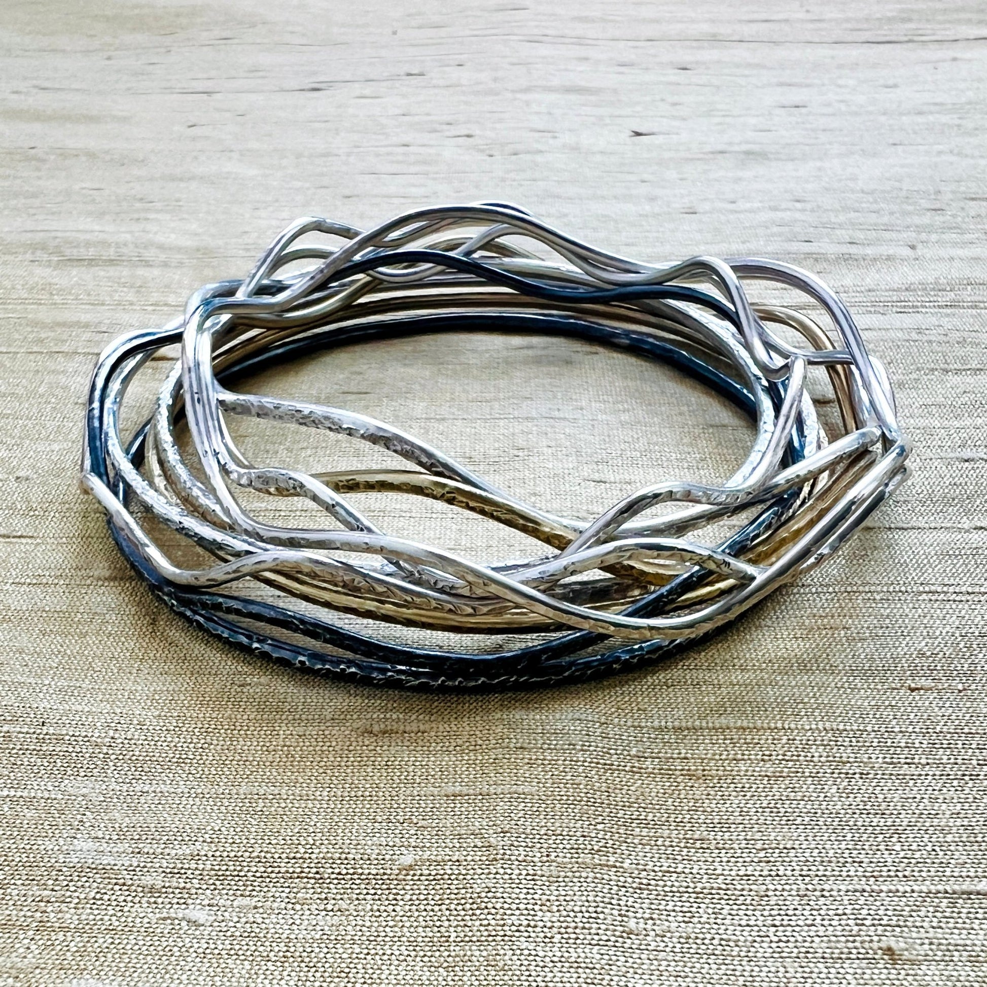 Silver Bangles Set – 6 Elemental Archetypes: textured and wavy bangles inspired by Earth, Water, Fire, Air, Light & Spirit.