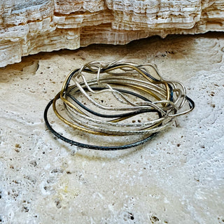 Silver Bangles Set – Six Elemental Archetypes: textured and wavy bangles inspired by Earth, Water, Fire, Air, Light & Spirit.