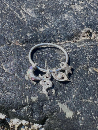 The Four‑Symbol Talisman Ring - 6 elements Studio